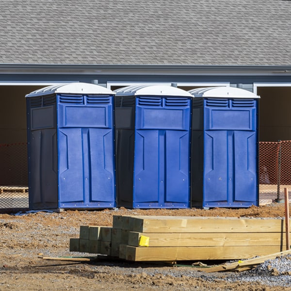 what is the cost difference between standard and deluxe portable toilet rentals in Bonnerdale